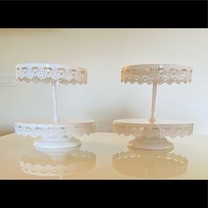 TWO double tier round stands with pedestal bases